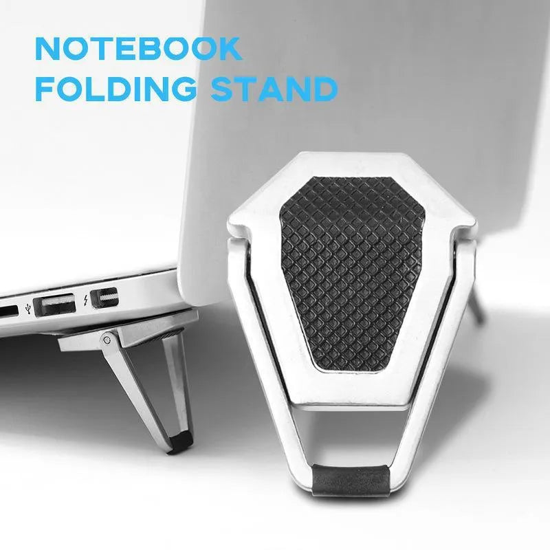 Compact silver aluminium folding laptop stand bracket shown next to 3M adhesive pads.