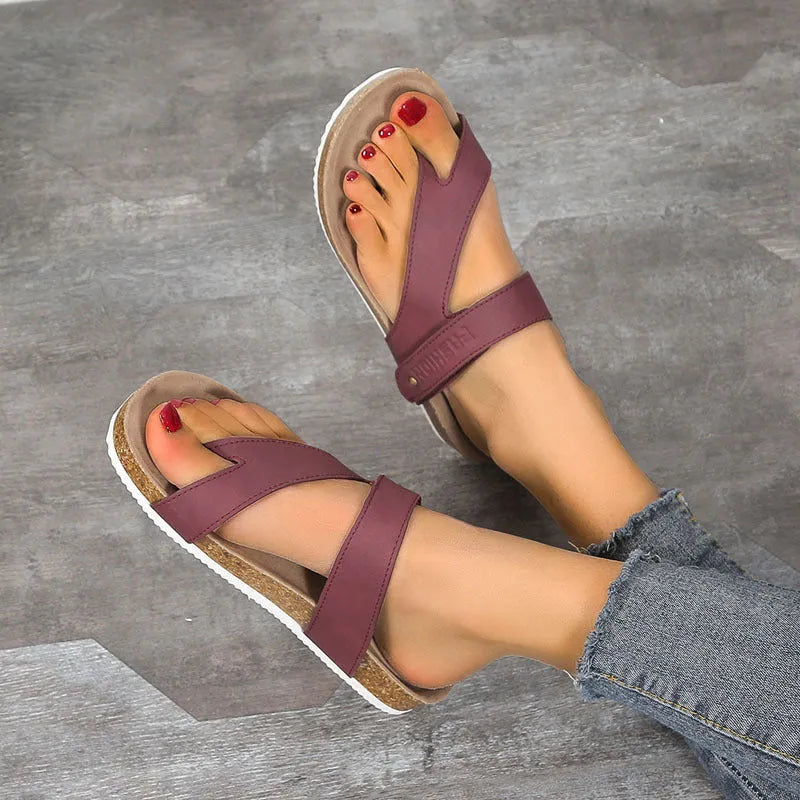 Women's flat toe ring flip-flops with a thick foam sole, shown in a solid colour.
