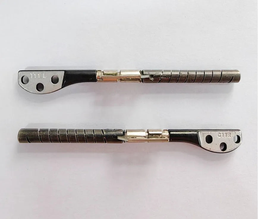 MacBook Pro 15-inch A1286 laptop screen replacement hinge shaft pair on foam packaging.