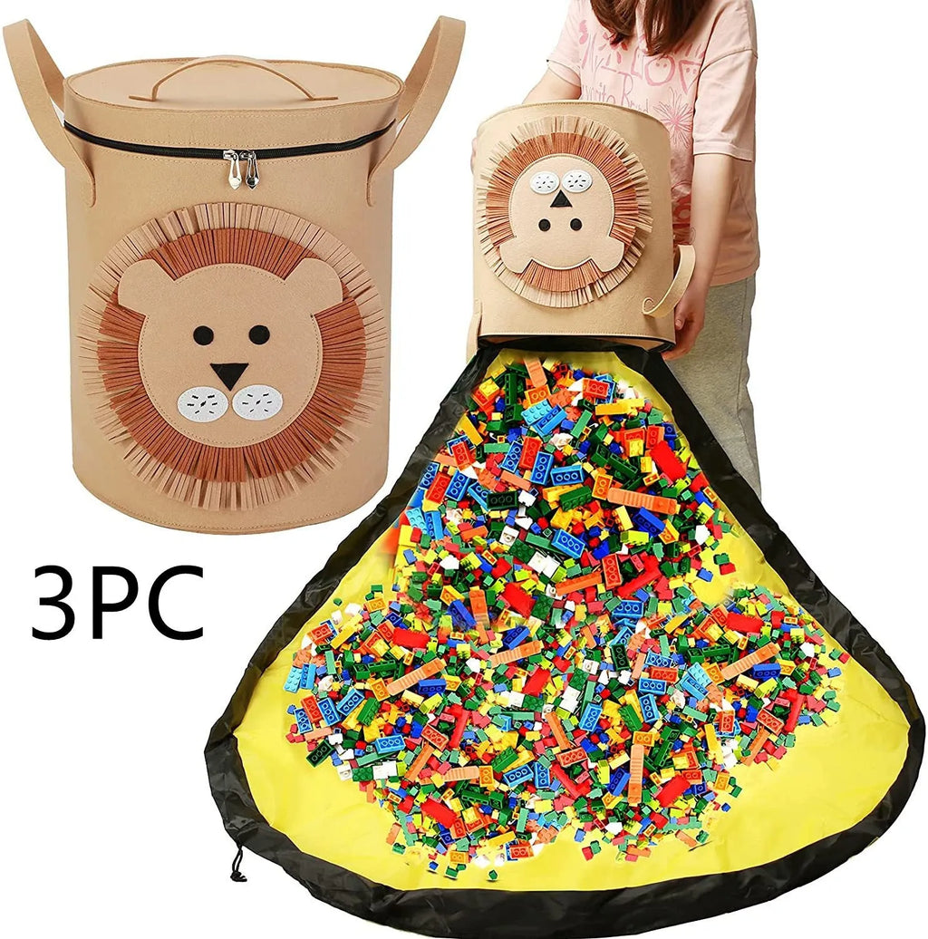 Green felt cube storage bag open as play mat with toys inside and pull rope visible