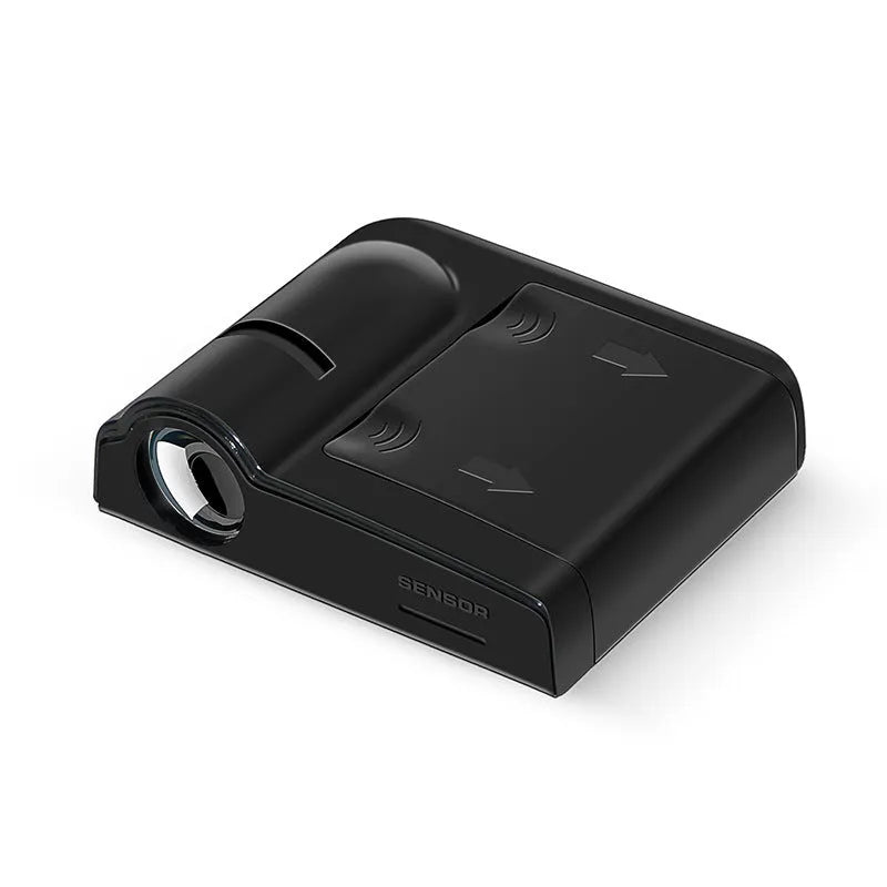 Compact black car interior projection lamp with universal fit, shown next to three AA batteries for scale.