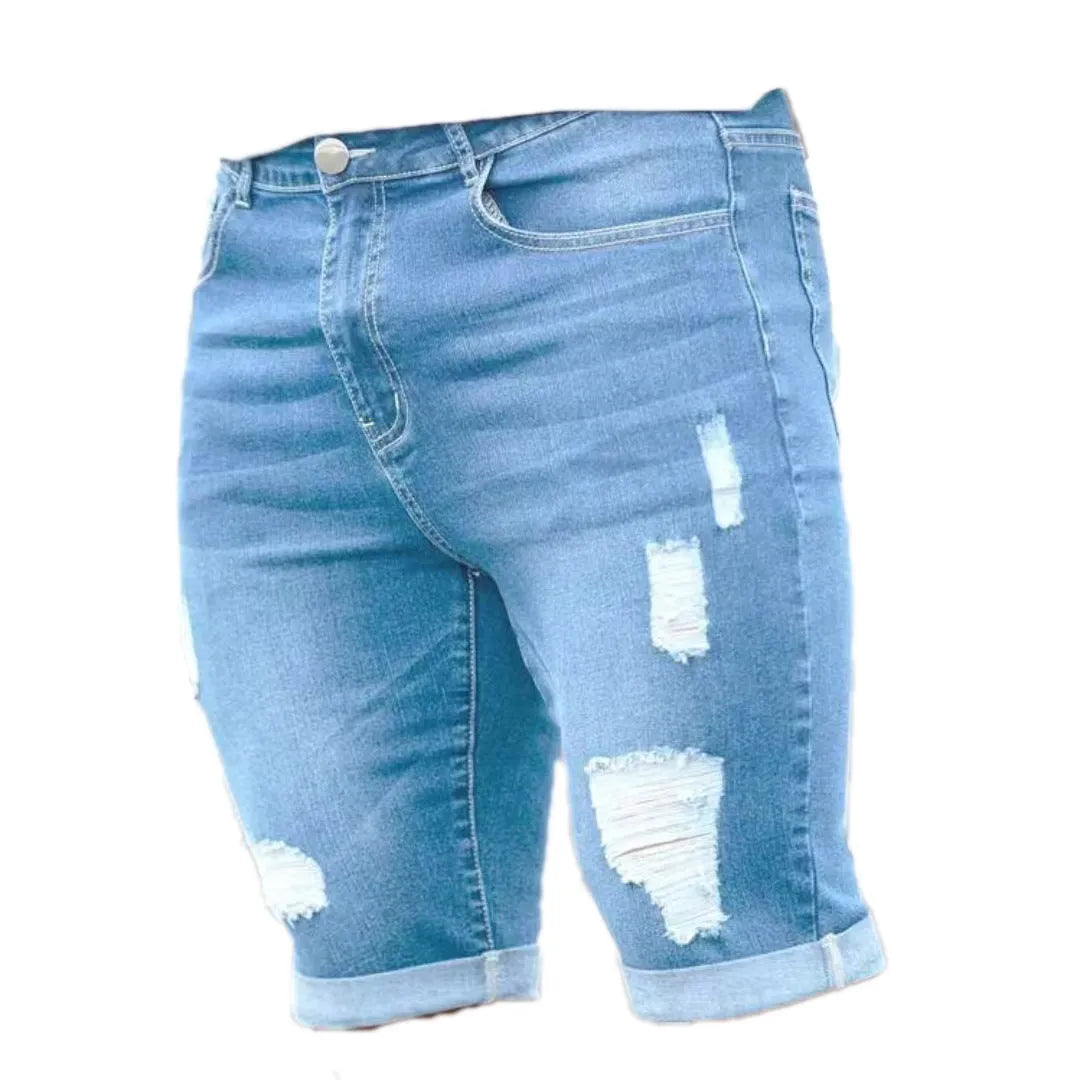 Sky blue distressed denim shorts with low-rise waist and zip fly closure