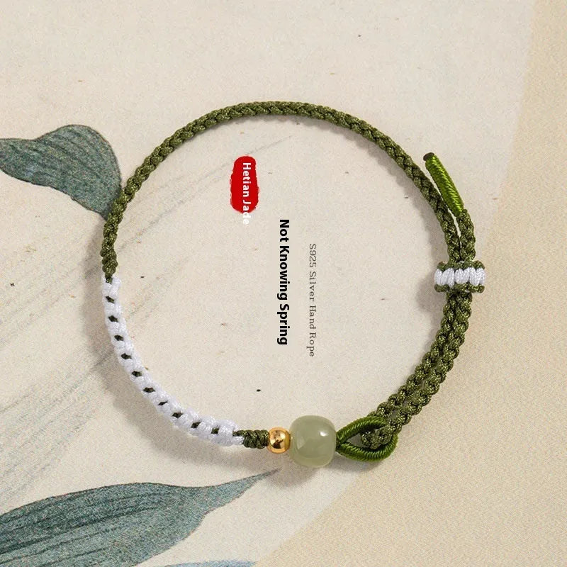 Chinese national bracelet with Hetian jade, sterling silver, and colourful cord carrying strap