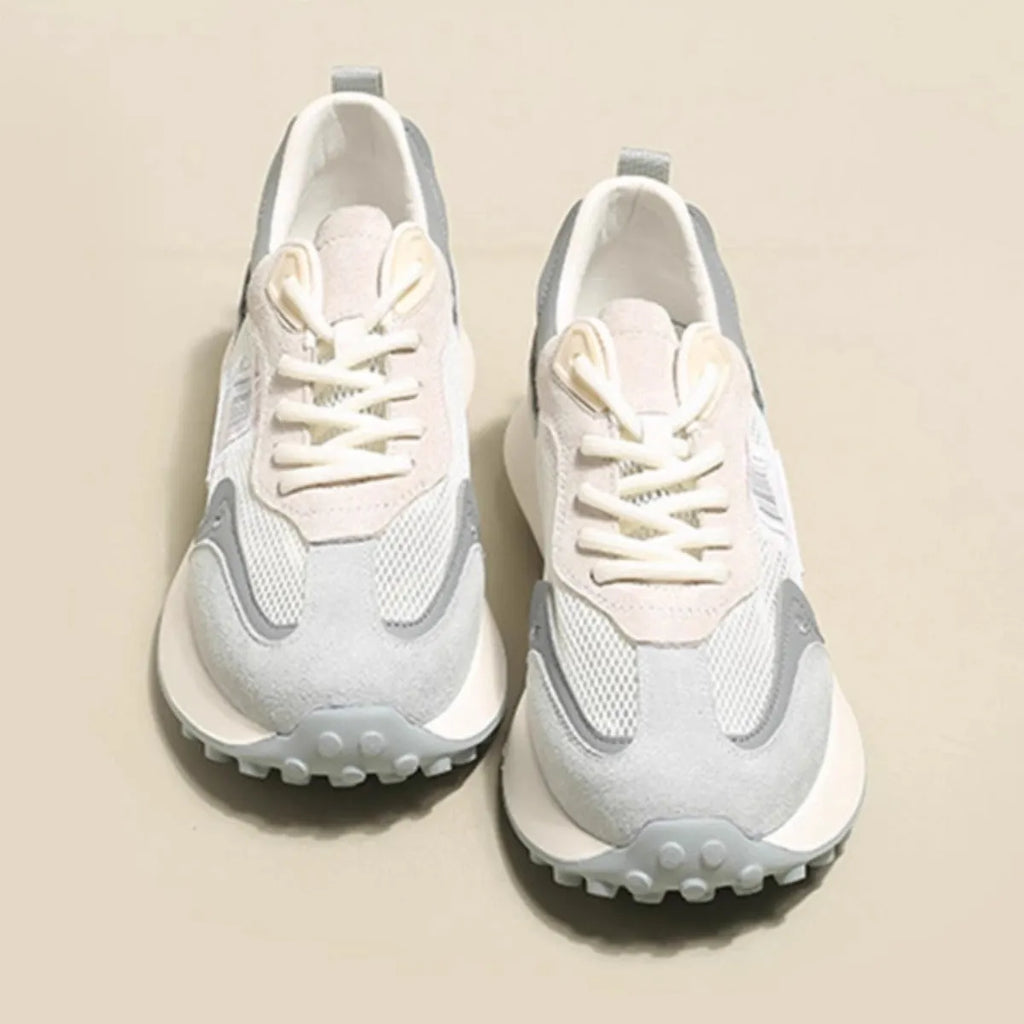 Women's low-top retro sneaker in grey with round toe, rubber sole, and shallow-cut design under 7cm.