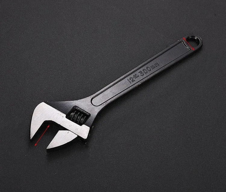 High-carbon steel adjustable spanner with black finish on a grey background.
