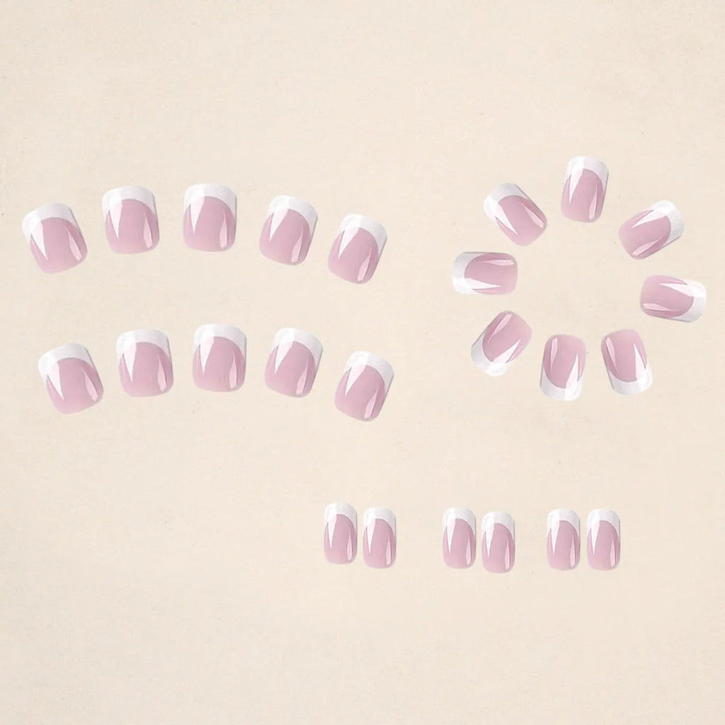 24 white square artificial nails with plaid pattern arranged in box