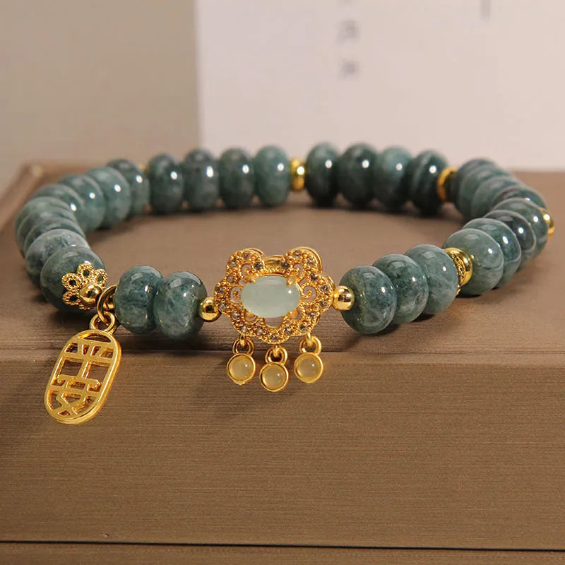 Women's natural emerald jade bracelet with abacus bead design and alloy safety lock closure