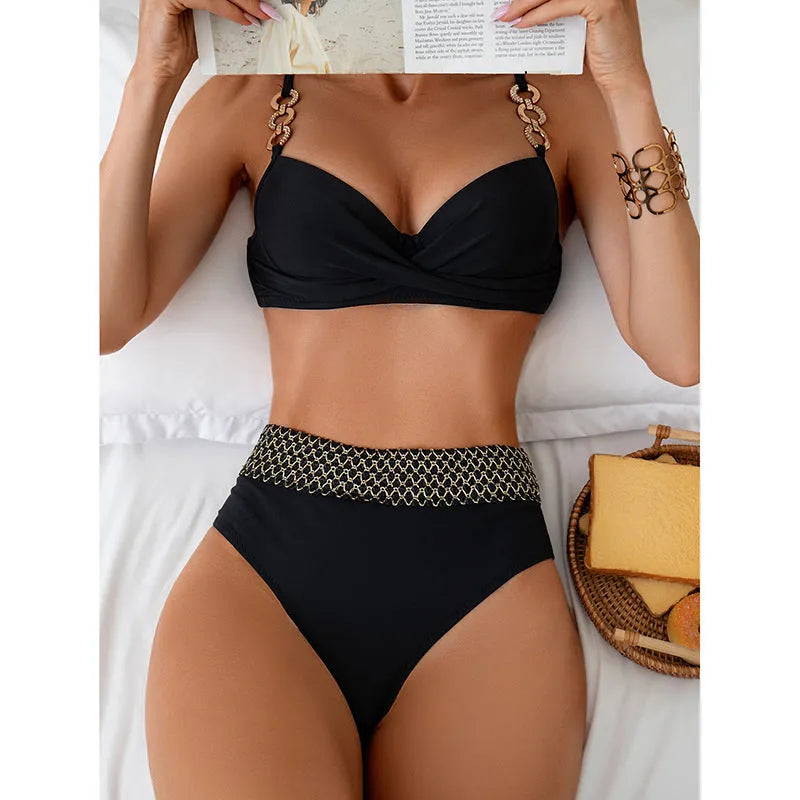 Black women's bikini swimsuit showing sleeveless top and briefs on a mannequin.