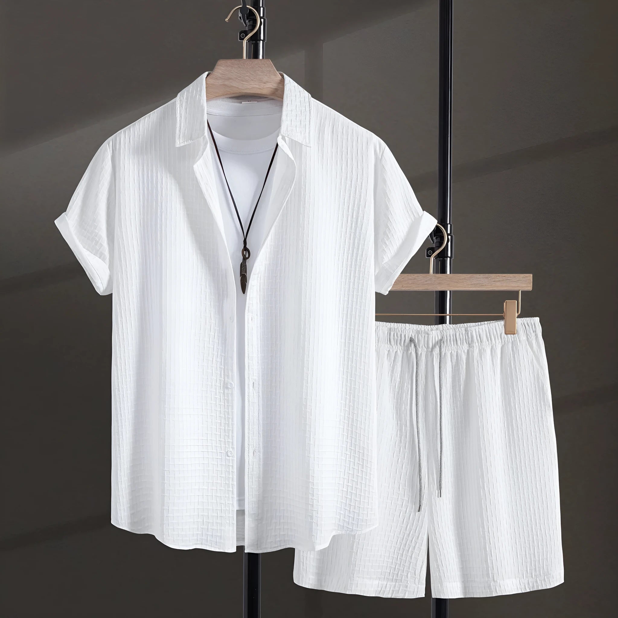 Men's black casual summer shirt and shorts suit with short sleeves on hanger