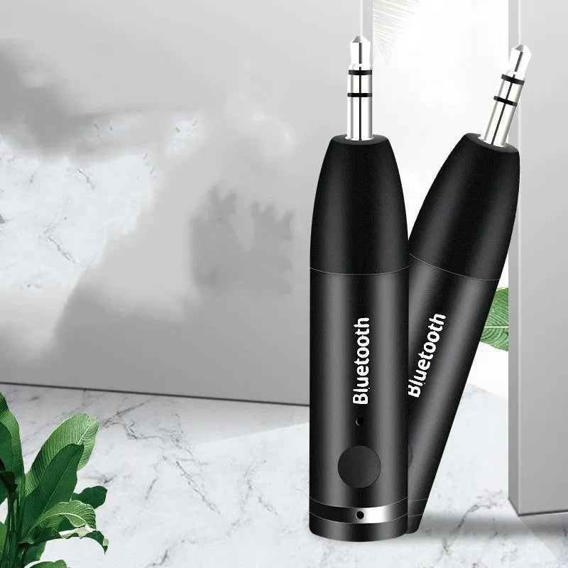 Black car AUX Bluetooth audio receiver with USB cable for wireless music streaming
