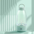 Automatic electric shaker bottle with USB charging port, handle, and blending button in green, pink, or white.