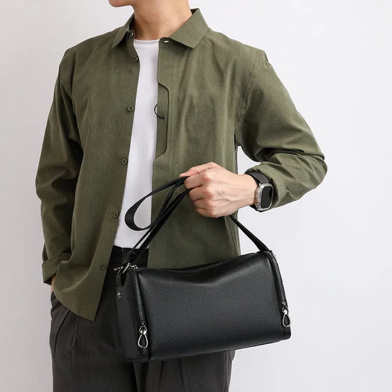 Genuine leather crossbody shoulder bag for men in black with stitching detail and large capacity interior