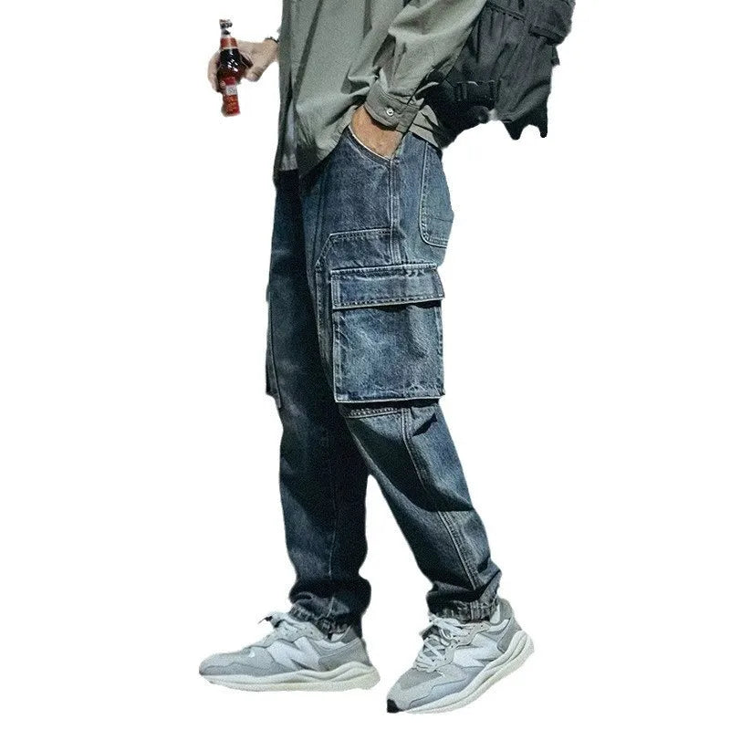 Men's blue loose straight leg retro style casual trousers on a neutral background
