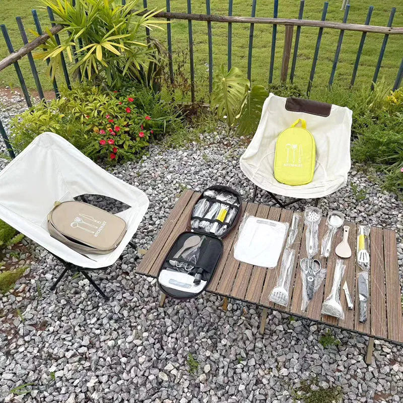 Portable khaki fabric bag containing a 12-piece stainless steel picnic cutlery set with knives, forks, spoons, and chopsticks.