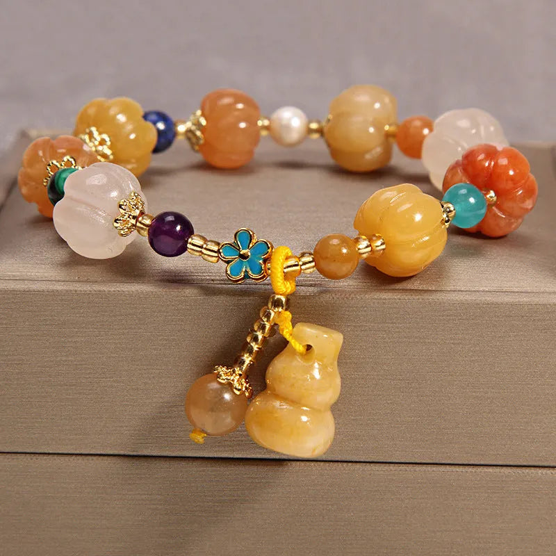Yellow agate crystal women's bracelet with gold silk thread wrapping in khaki colour
