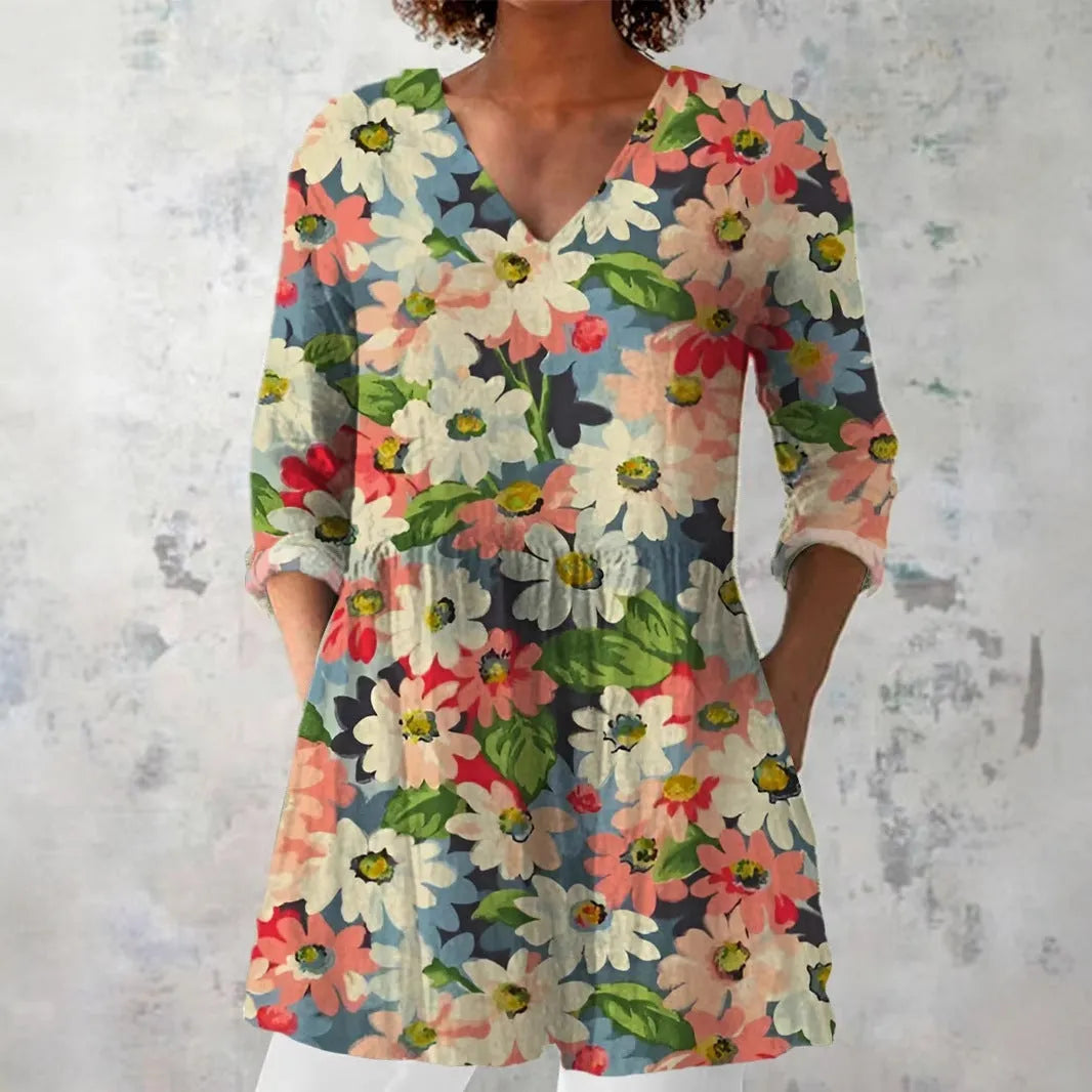 Women's retro style slim fit long-sleeved top with a printed design, shown in one of 12 available colours.