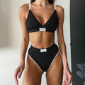 Women's grey embroidery bikini set with black contrast binding, sleeveless top and shorts