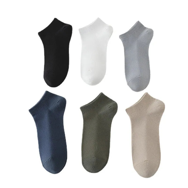 Men's solid colour low-cut polyester boat socks shown in one of six available colour variants.