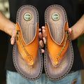 Men's dark blue herringbone outdoor slippers with a rubber sole, shown in a large size.