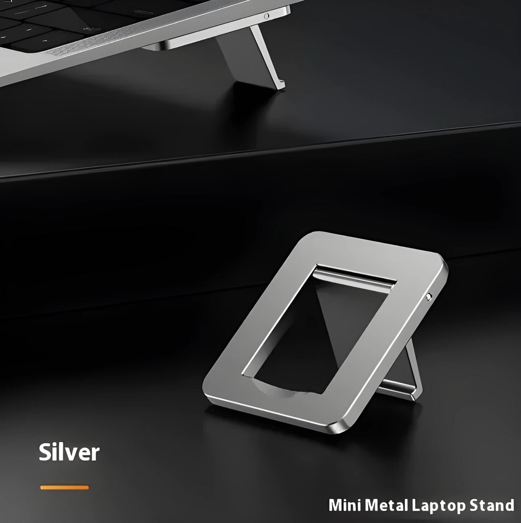 Compact silver aluminium folding laptop stand bracket shown next to 3M adhesive pads.