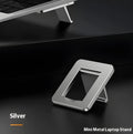 Compact silver aluminium folding laptop stand bracket shown next to 3M adhesive pads.