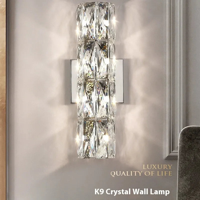 Crystal wall lamp with stainless steel base in chrome finish, LED light source