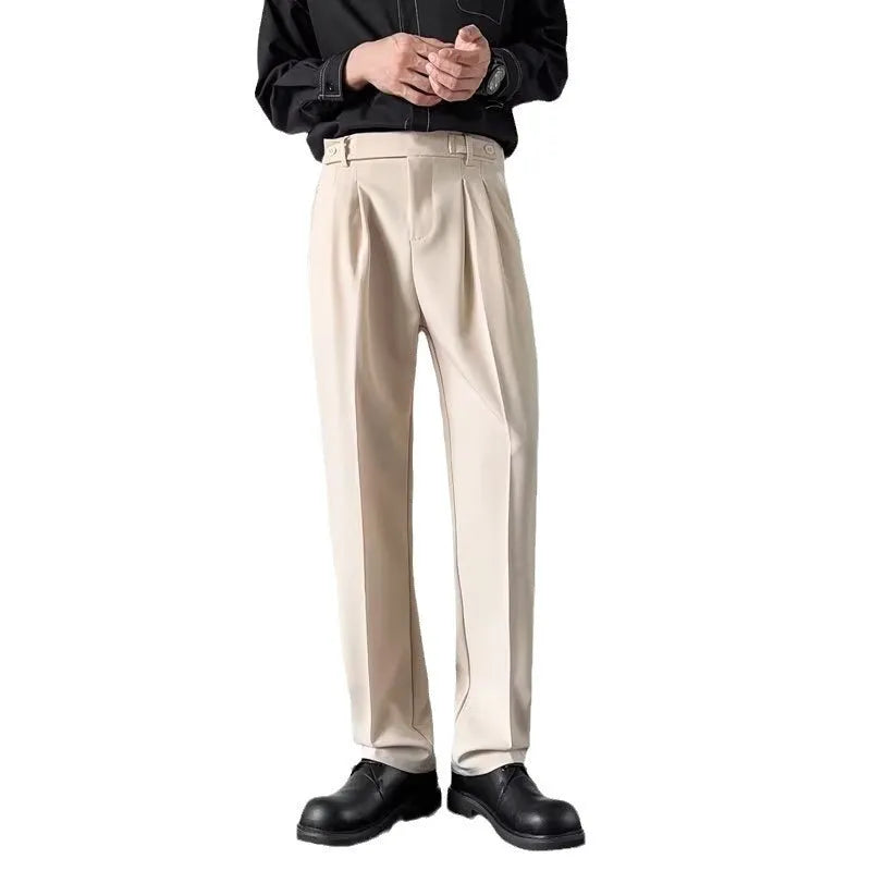 Men's straight fit suit trousers in apricot colour showing looser leg cut and polyester fabric texture