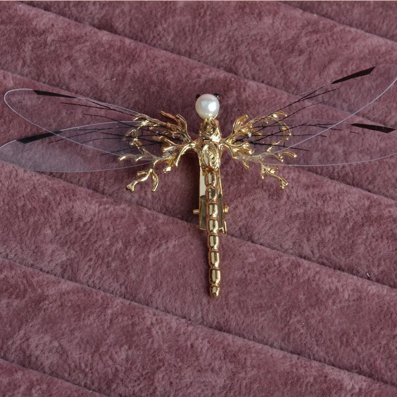Golden dragonfly side clip headdress with electroplated alloy construction and jucai decoration