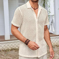 Man wearing a short sleeve lapel cardigan shirt in a solid light colour for summer.