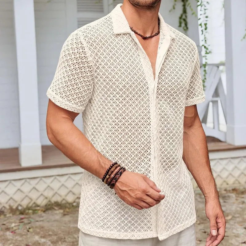 Man wearing a short sleeve lapel cardigan shirt in a solid light colour for summer.