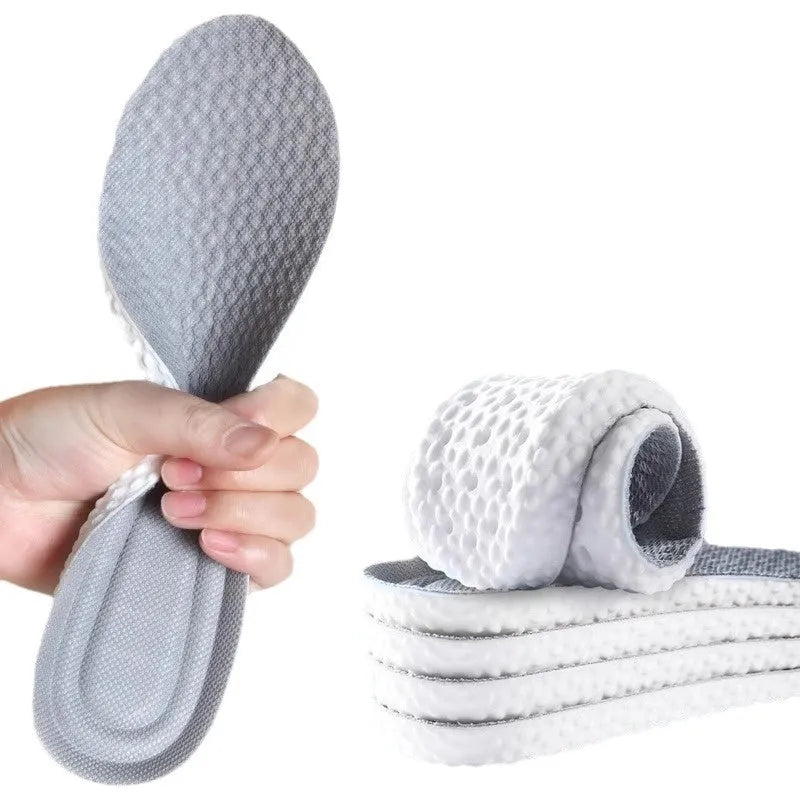 PU sports insoles in black, grey and orange colours with trimmable edges for custom sizing