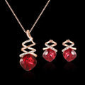 Alloy bridal jewellery set with water wave chain necklace and matching earrings on white background.