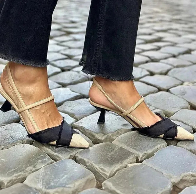 Apricot black colour block women's stiletto heel sandals with pointed toe and ankle buckle.