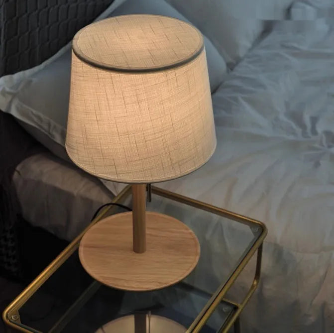 Walnut colour solid wood bedside lamp with fabric shade and pull cord switch