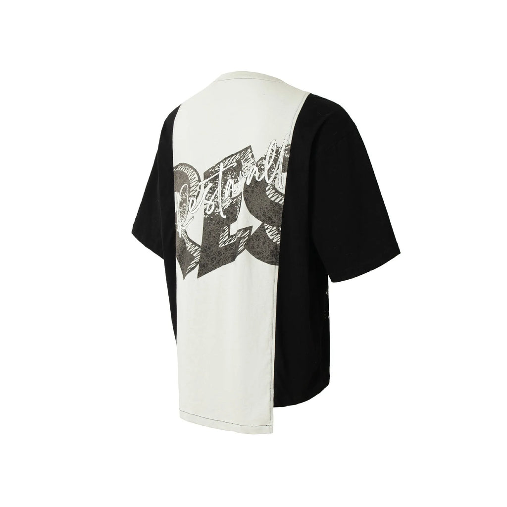 Black and white broken collage print on a loose-fit cotton blend t-shirt.