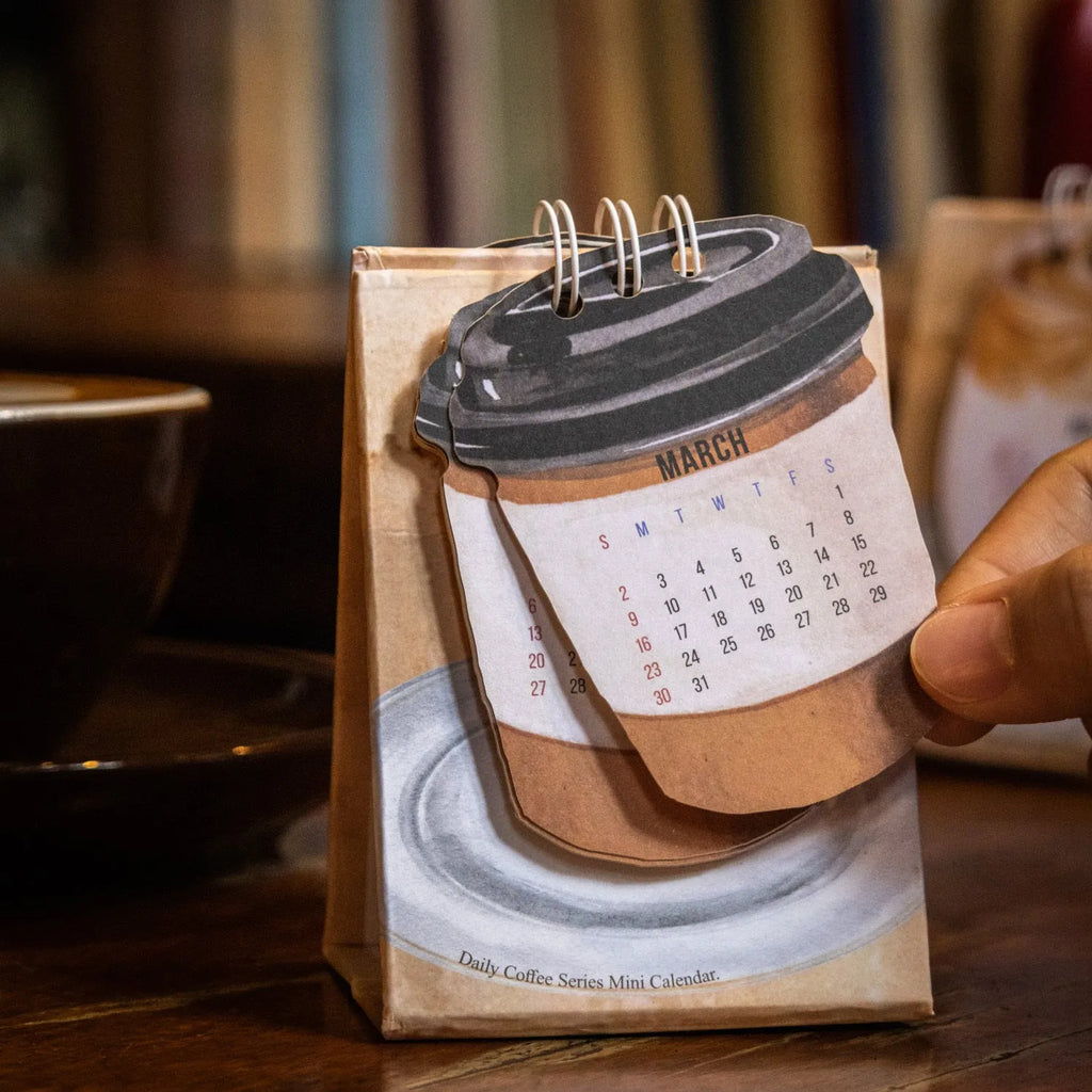 Coffee mini desk calendar 2025 set showing four different themed designs