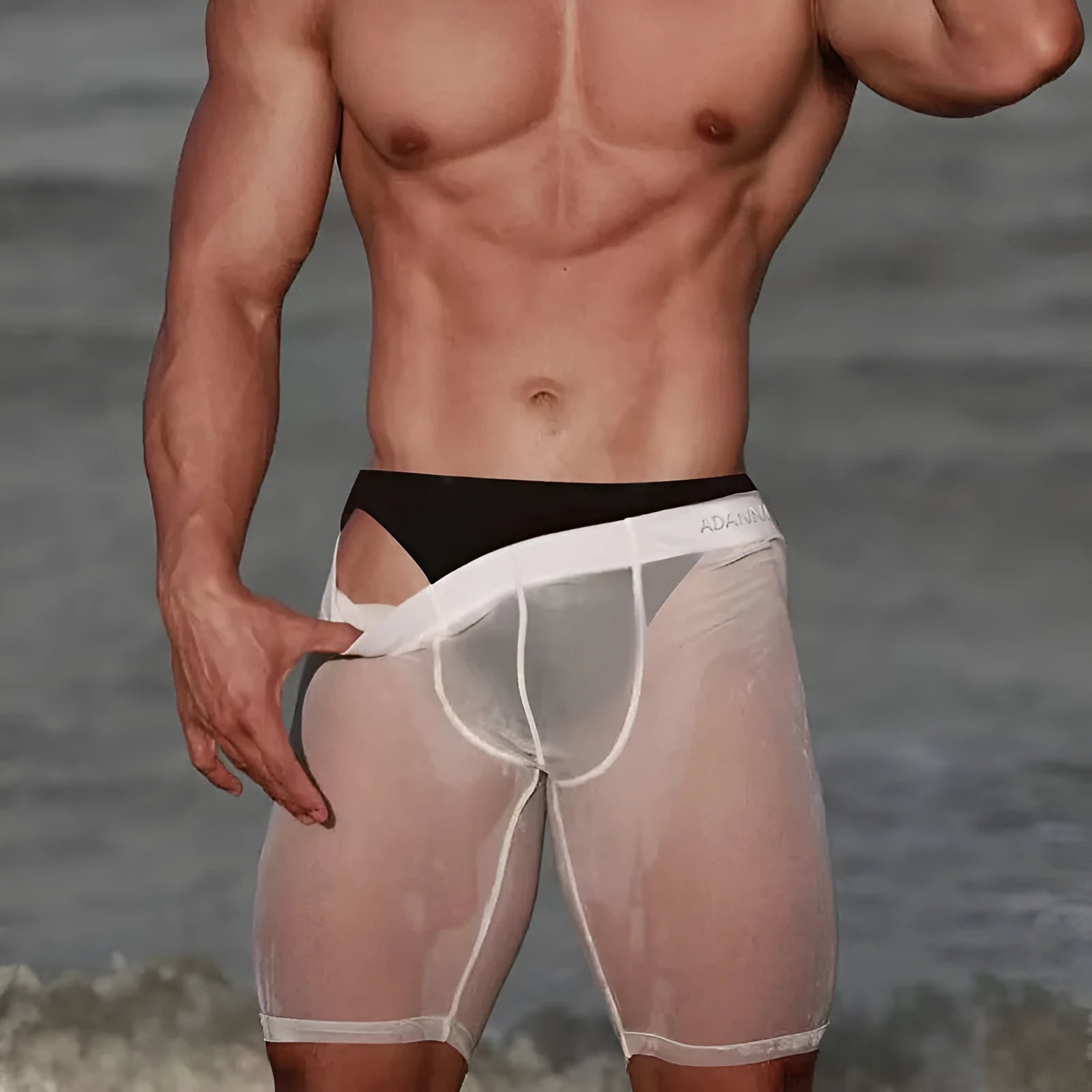 Men's mesh home shorts in black nylon with seamless knitting construction