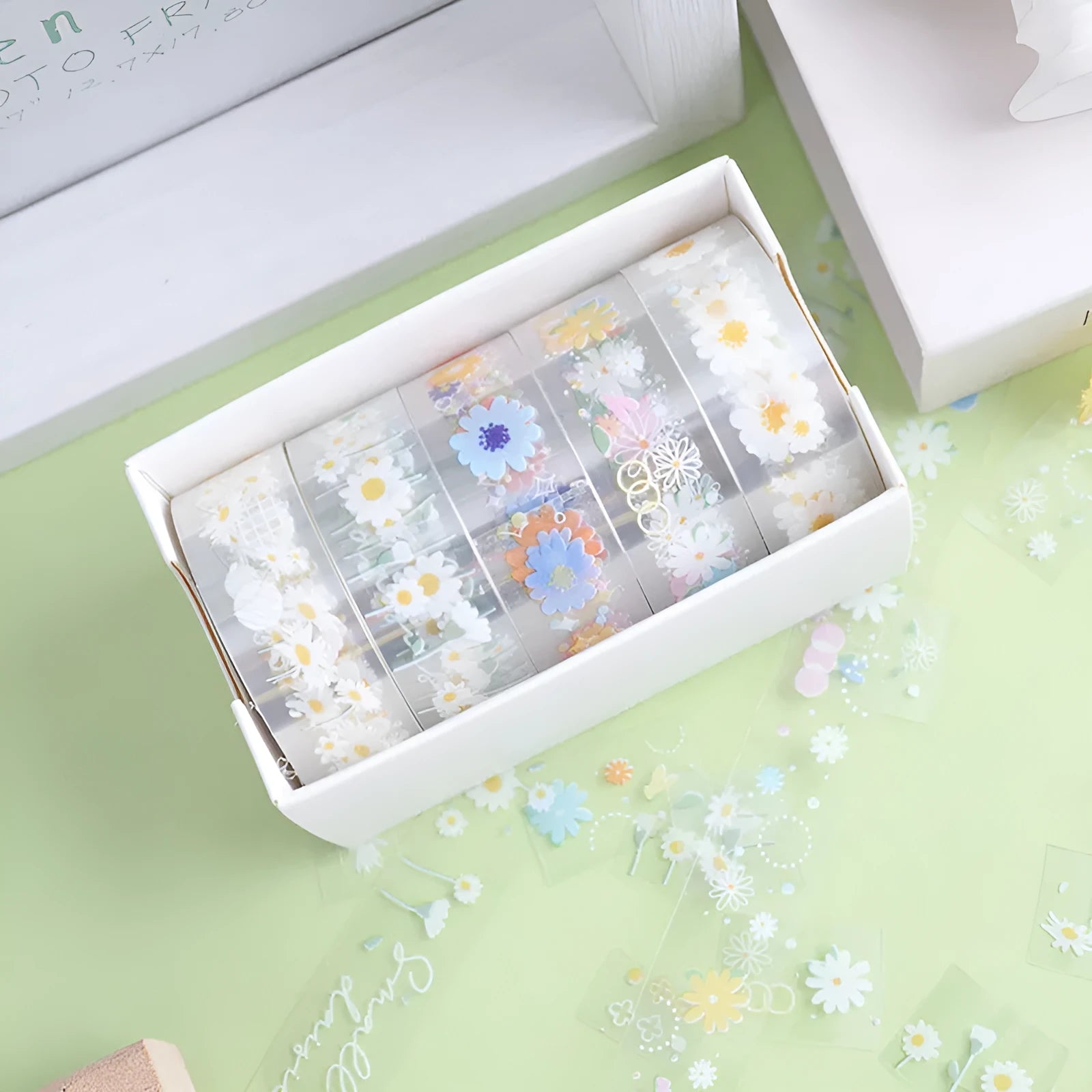 Five rolls of transparent decorative tape with colourful Midsummer Daisy cartoon designs