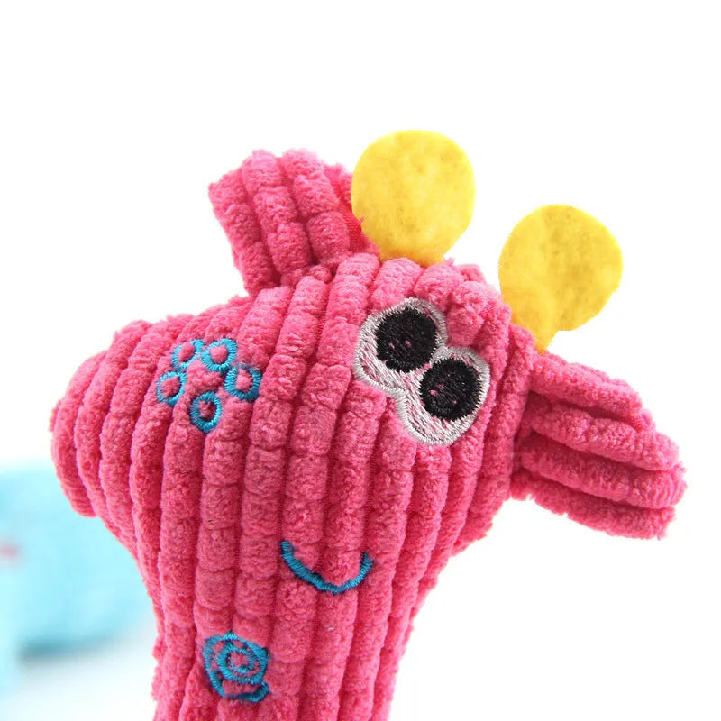 Blue deer-shaped plush dog toy with corn grain texture fabric and a squeaker inside.