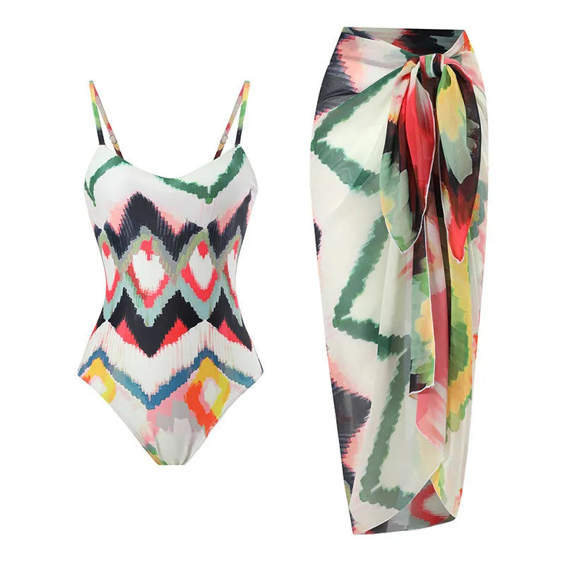 Women's two-piece beach swimsuit set with matching hip skirt in striped pattern