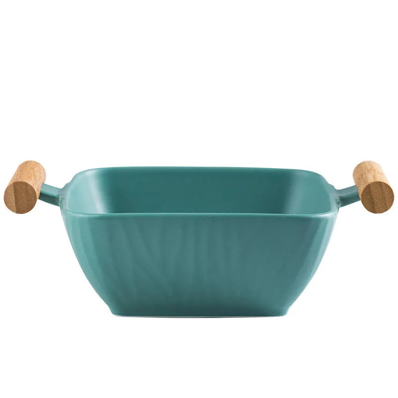 Modern irregular shaped ceramic bowl with matching lid in heat-resistant porcelain