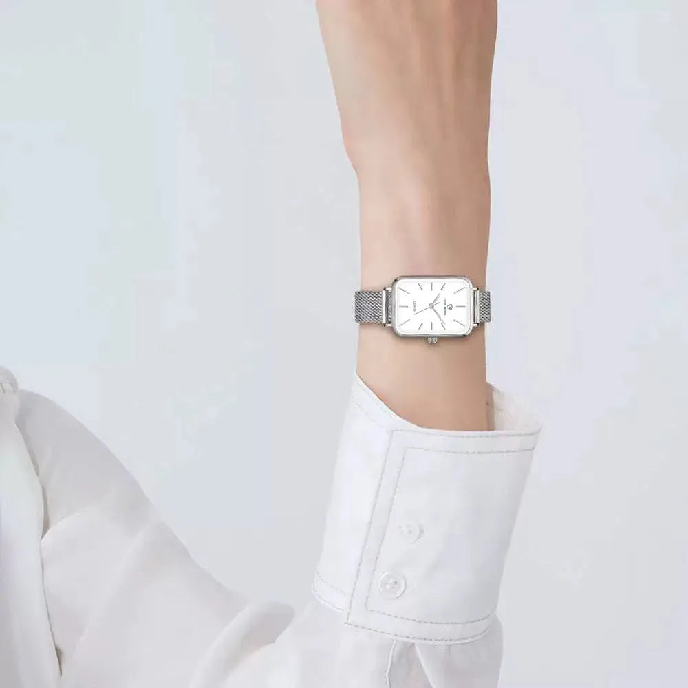 Women's waterproof quartz watch with woven steel strap and alloy case in rose gold or silver