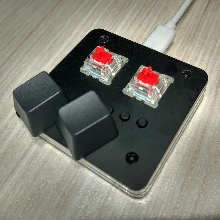 USB mini keyboard with multimedia keys in choice of four colours