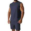 Men's sleeveless cotton blend sports suit showing top and shorts in a solid colour.