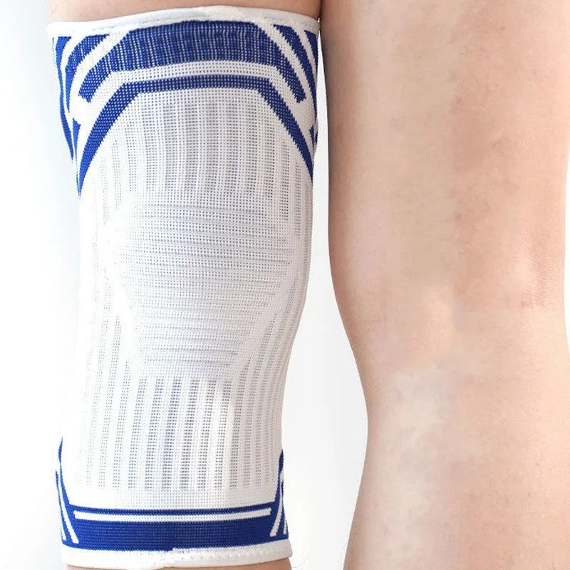 Blue high elasticity cotton knee pad for adult basketball and sports protection.