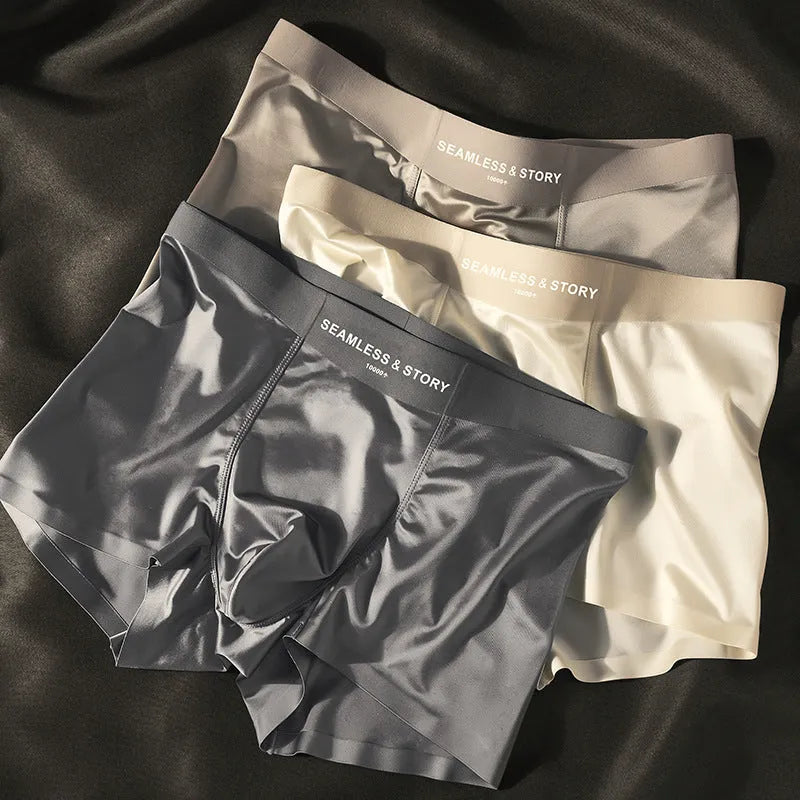 Men's ice silk satin underwear in mid waist cut showing coffee, light grey, white and blue colour options