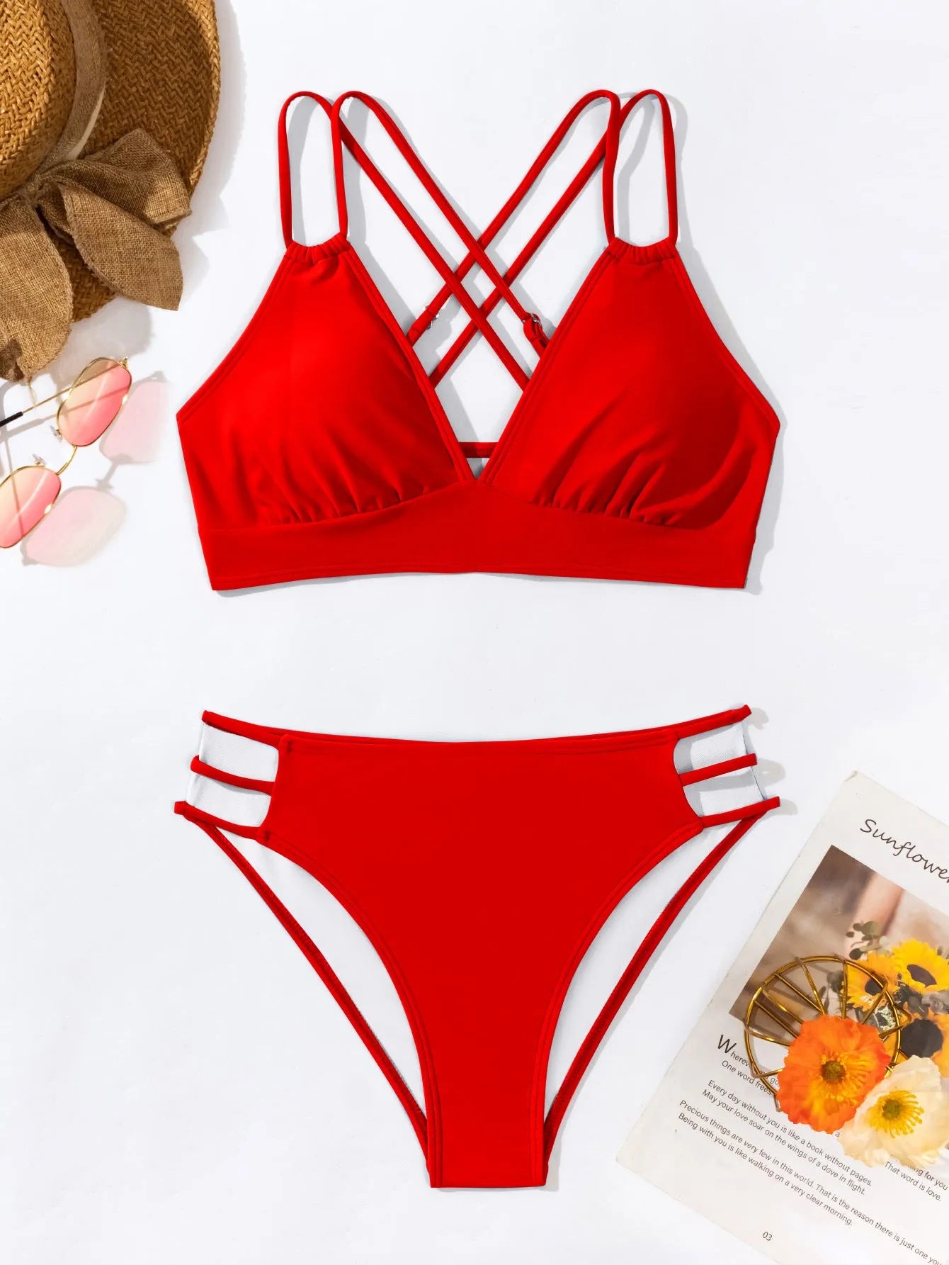 Women's black halter V-neck bikini top and matching split-style swim shorts.