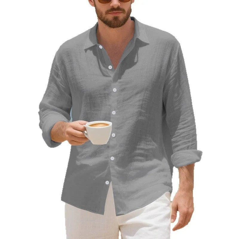 Man wearing a loose fit linen casual shirt in army green colour, showing button-up front and non-ironed texture.