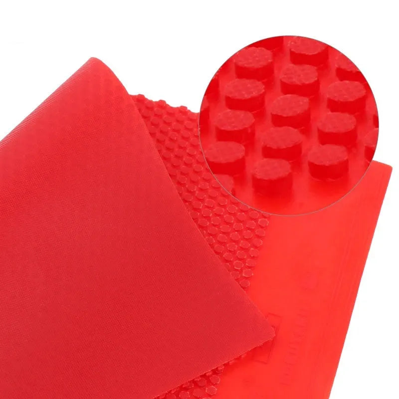 Single sheet of black table tennis rubber with small pips texture for racket replacement.