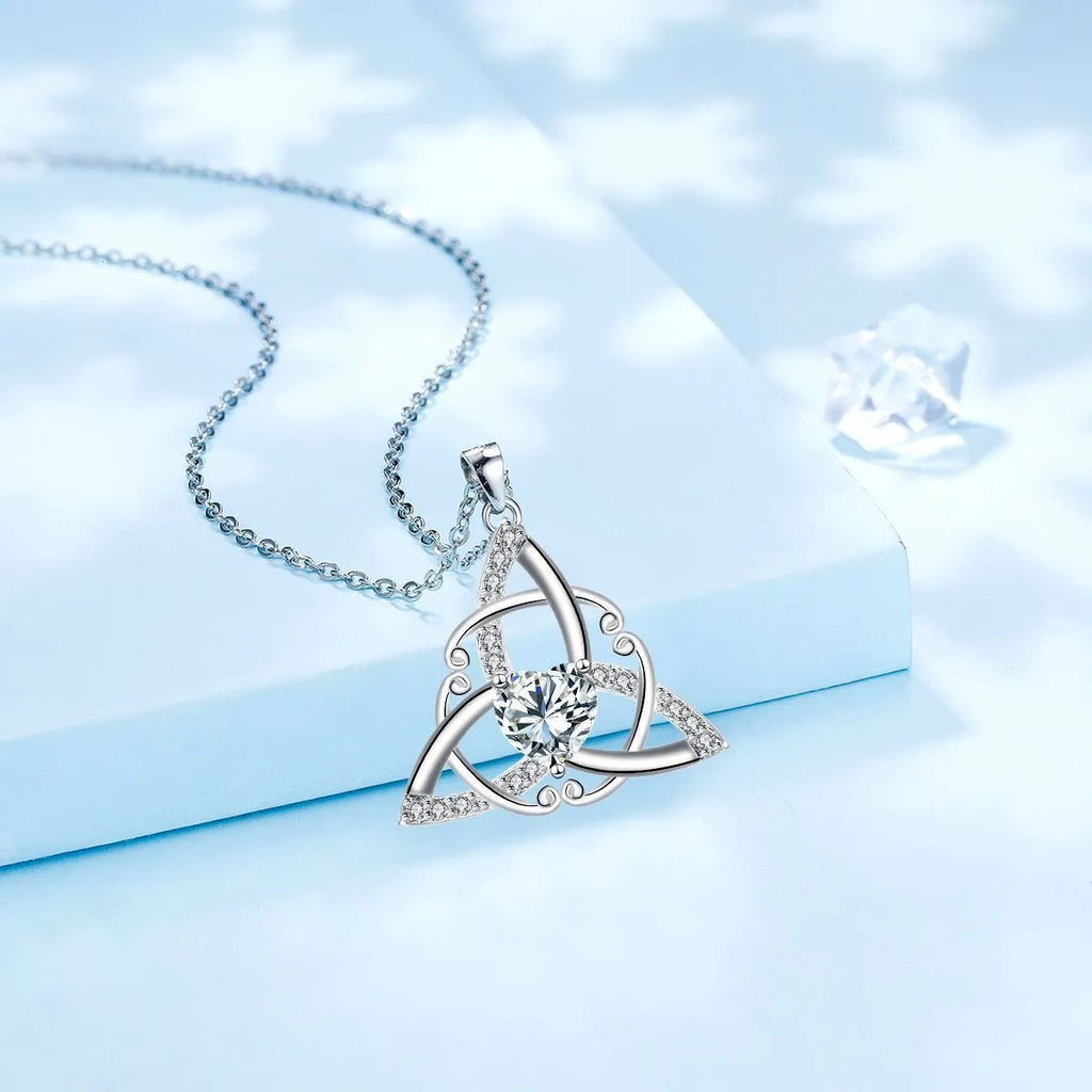 Women's copper Celtic knot necklace with geometric pendant in blue, lvzuan, red diamond, or white diamond finish.